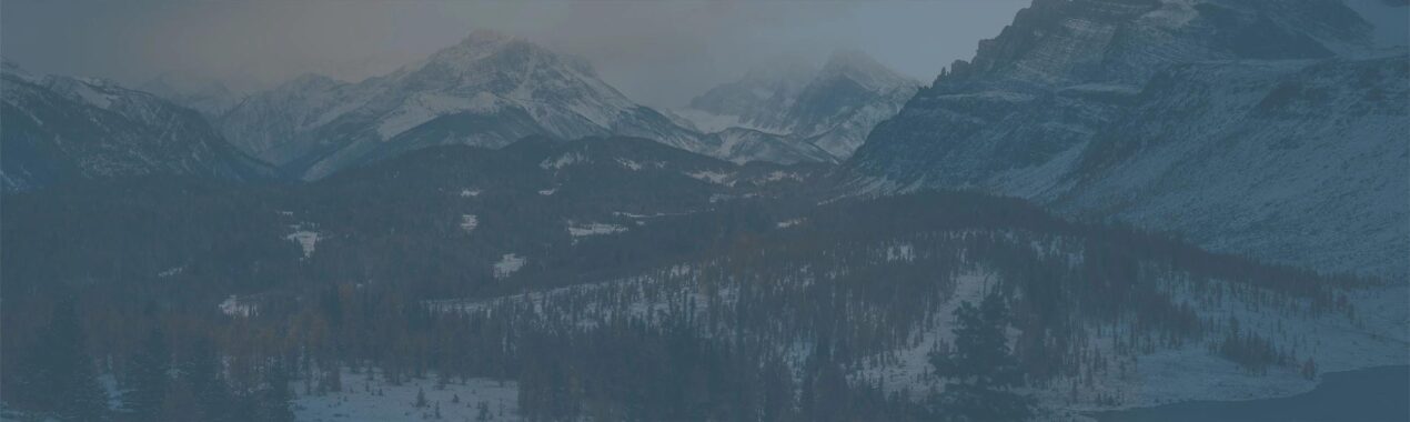 Photo of foggy mountains. Featured image for advisor software pricing article